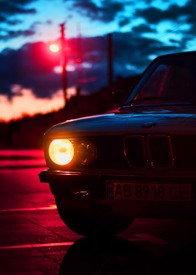 BMW Headlight at Dusk