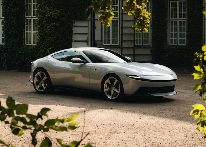 Silver Ferrari Roma parked outdoors