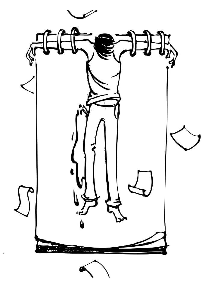 Man crucified on a notebook