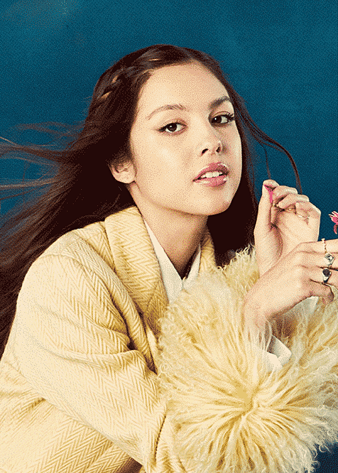 Olivia Rodrigo in Yellow Coat