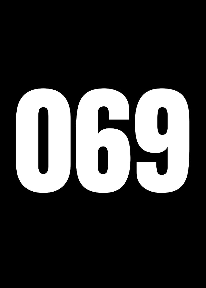 White Numbers 069 on Black Background