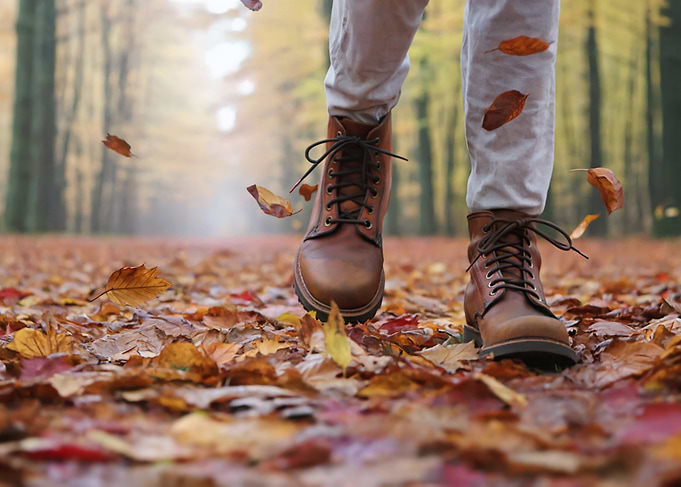 Walking through autumn leaves