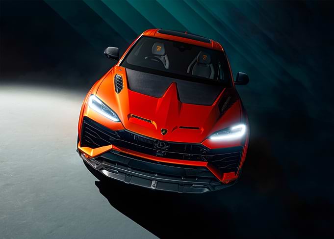 Orange Lamborghini Urus with Carbon Fiber Accents