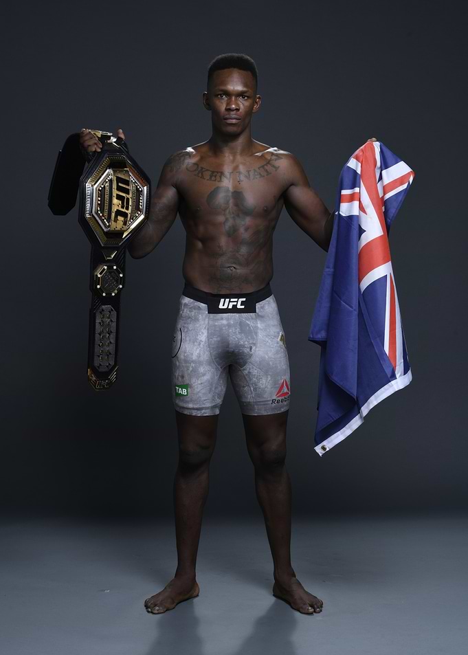 UFC Champion Israel Adesanya with Belt and Flag