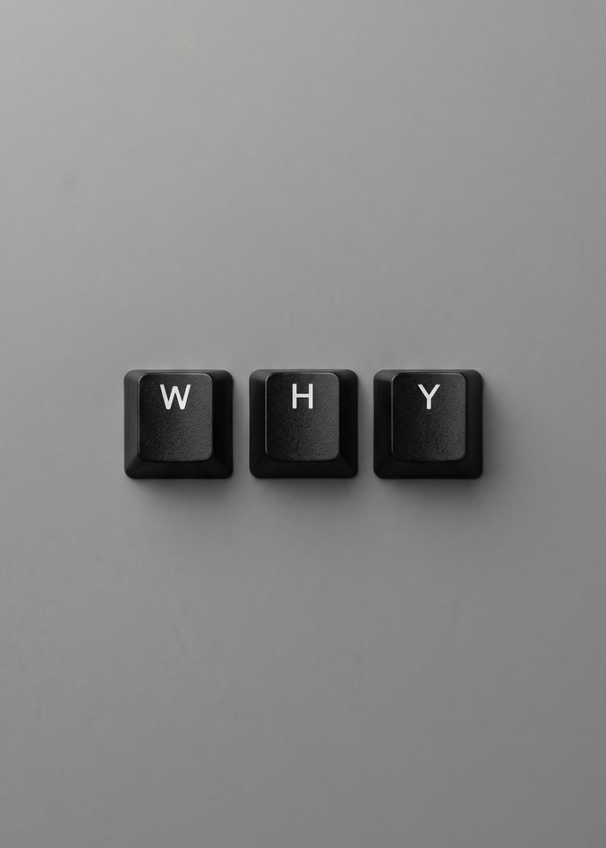 Keyboard keys spell WHY