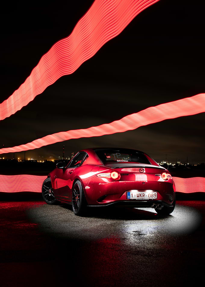 Red Mazda MX-5 with Light Trails