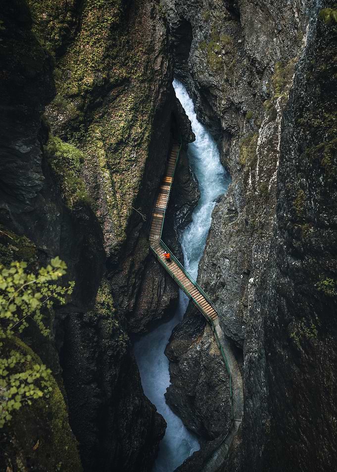 Person on a boardwalk in a gorge