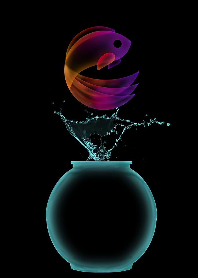 Neon Fish Jumping Out of Fishbowl