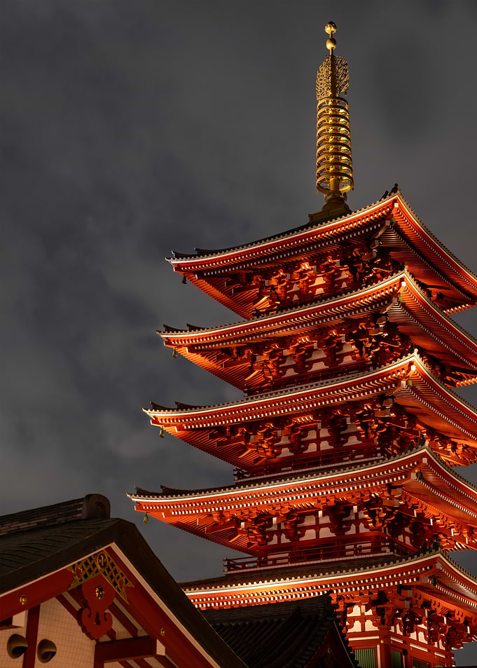 Illuminated Japanese Pagoda at Night