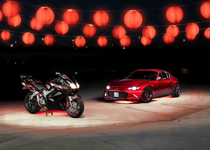 Red Mazda Miata and Black Honda VFR800