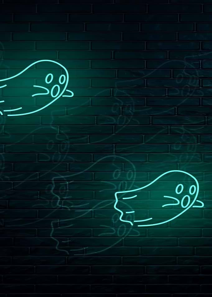 Neon Ghosts on Brick Wall