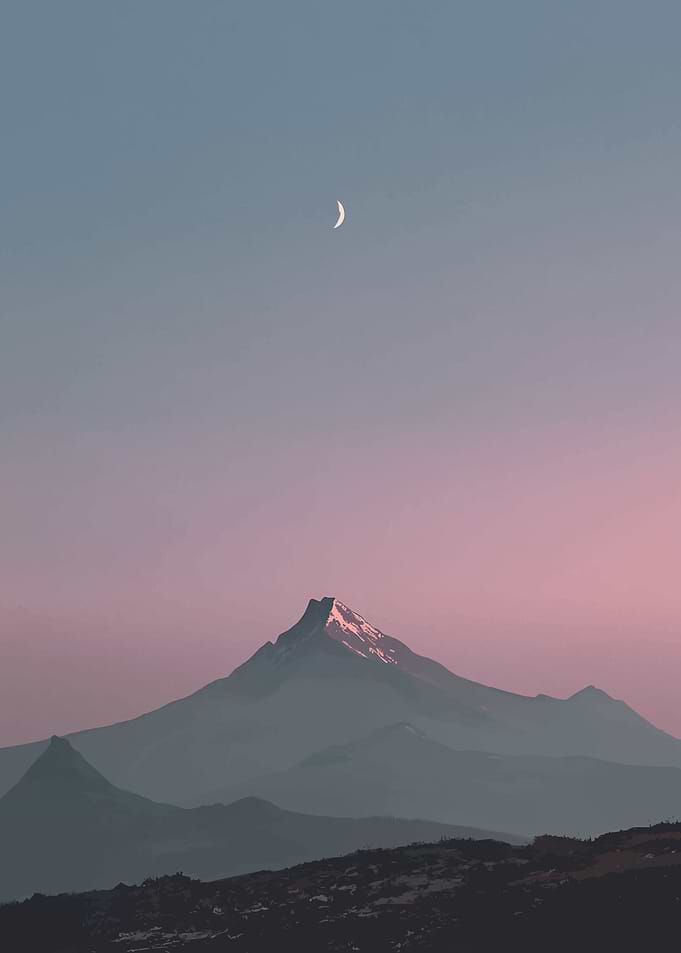 Mountain peak under crescent moon