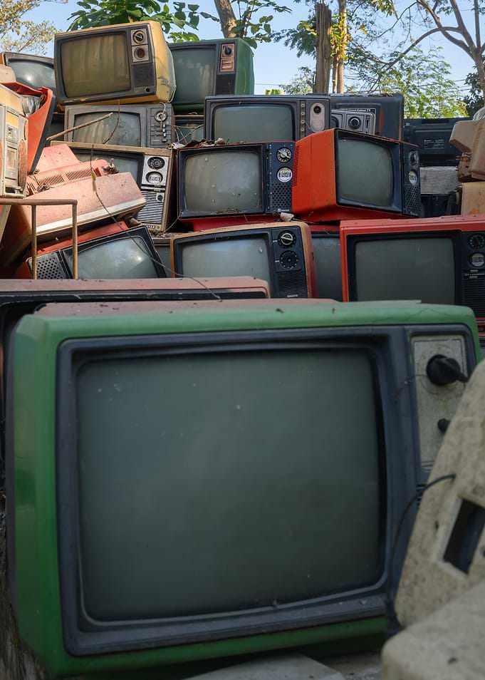 Pile of Vintage Televisions
