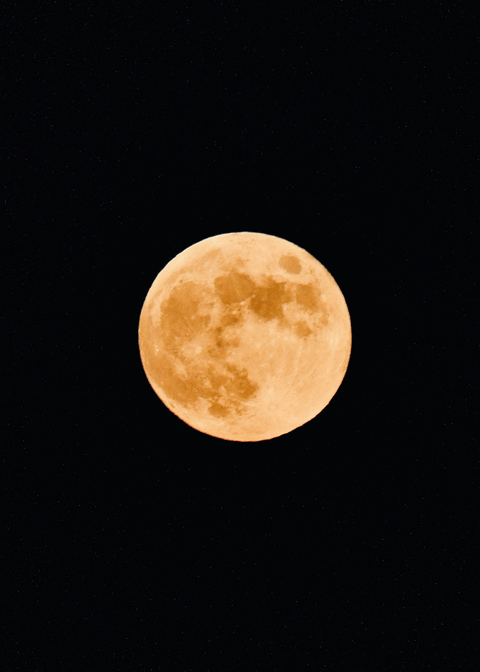 Orange Full Moon in Starry Sky