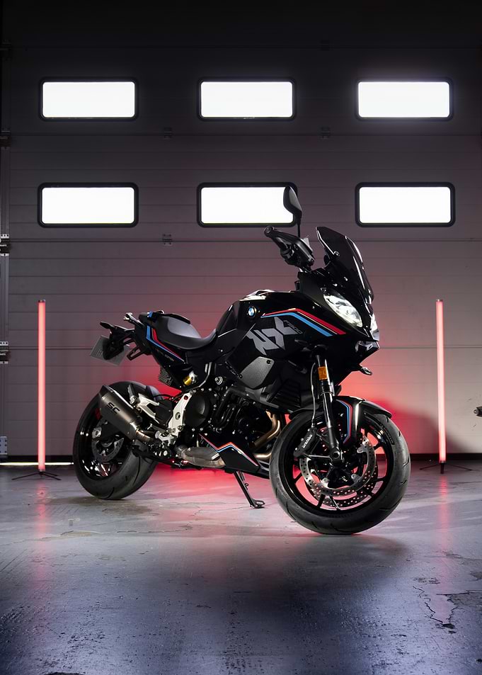 Black BMW Motorcycle with Red Lighting