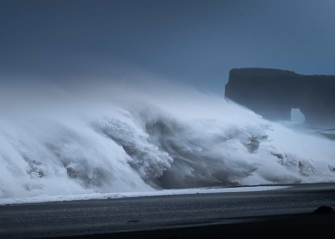 Crashing Waves on a Dark Beach
