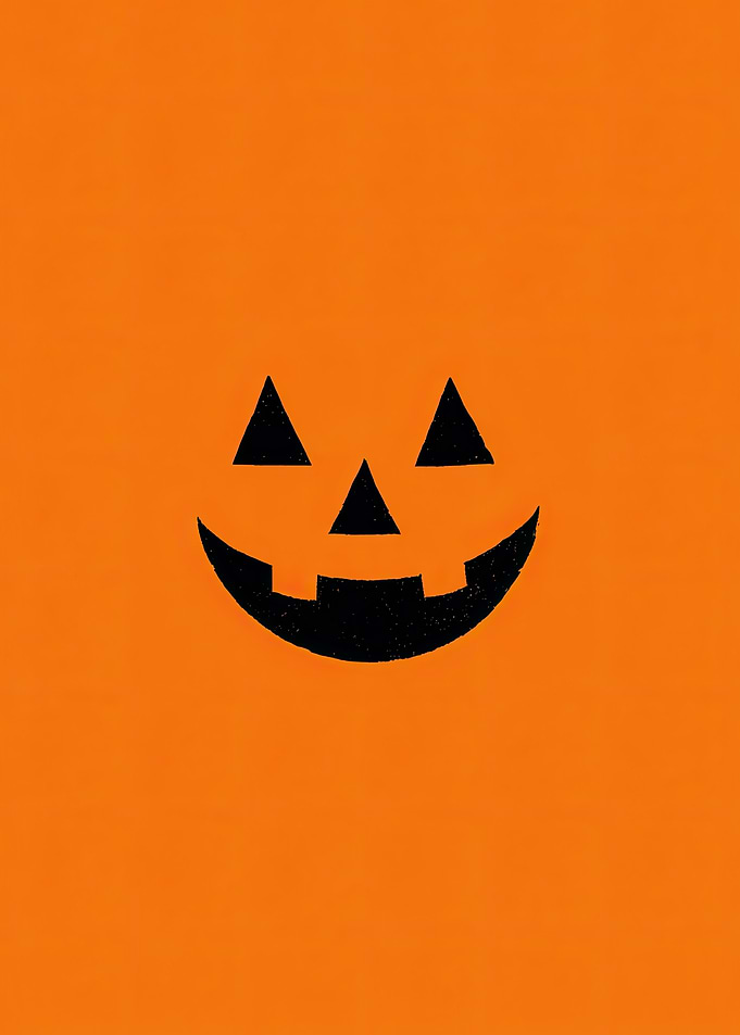 Jack-o'-lantern face on orange background