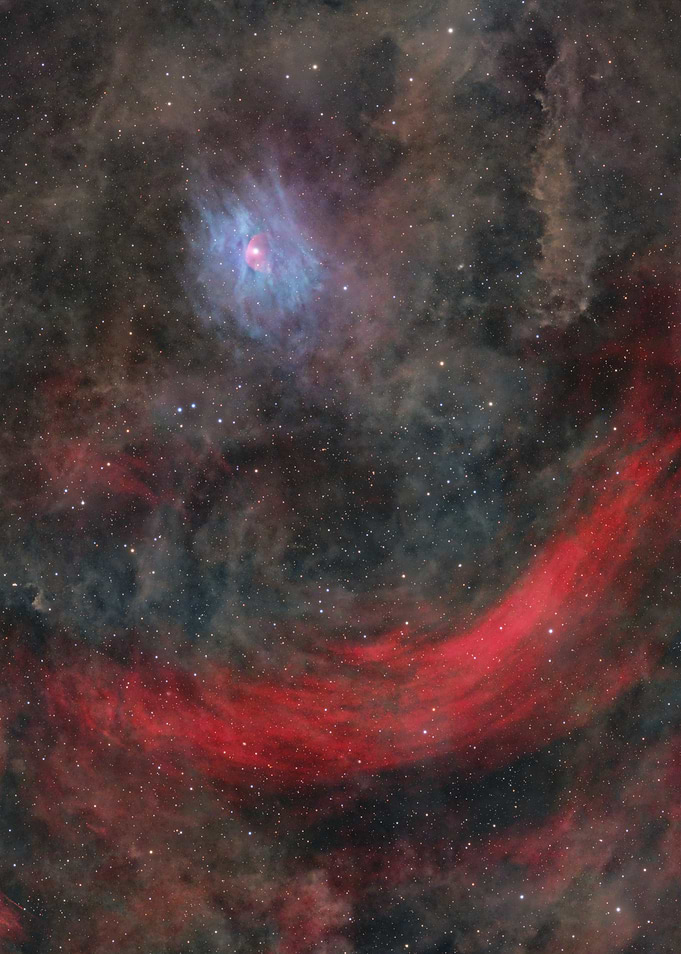 Cosmic Nebula with Red and Blue Hues