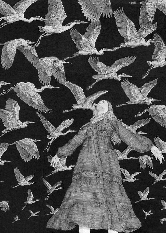 Woman surrounded by flying birds
