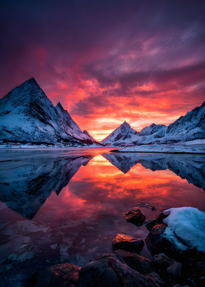 Dramatic Sunset Over Snowy Mountains