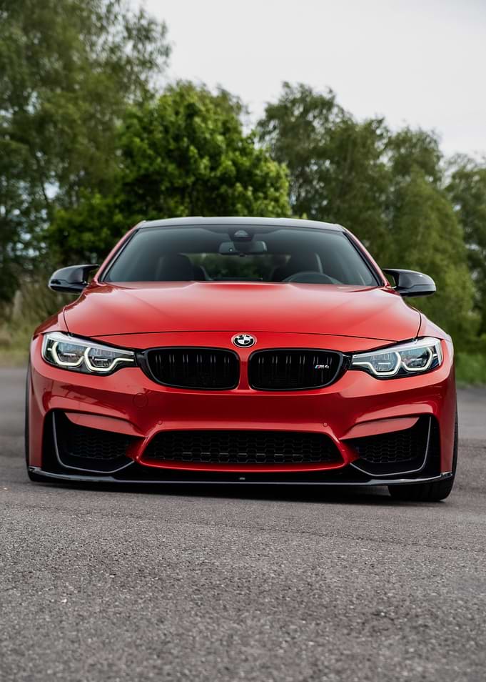 Orange BMW M4 Coupe Front View