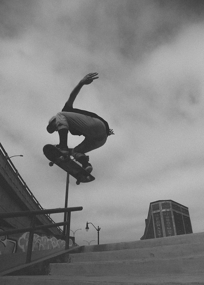 Skateboarder performing a trick in the air
