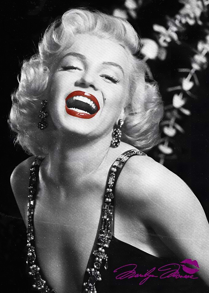 Marilyn Monroe laughing with red lipstick