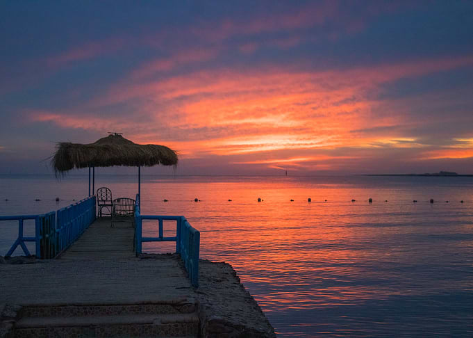 Pier at Sunset Over the Ocean