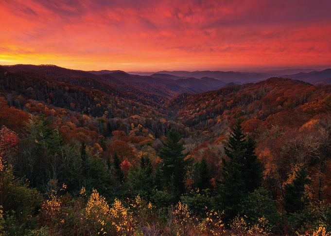 Vibrant Sunset Over Autumn Mountains