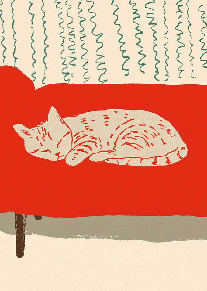 Cat Sleeping on a Red Couch