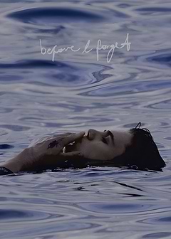 Person floating in water with text