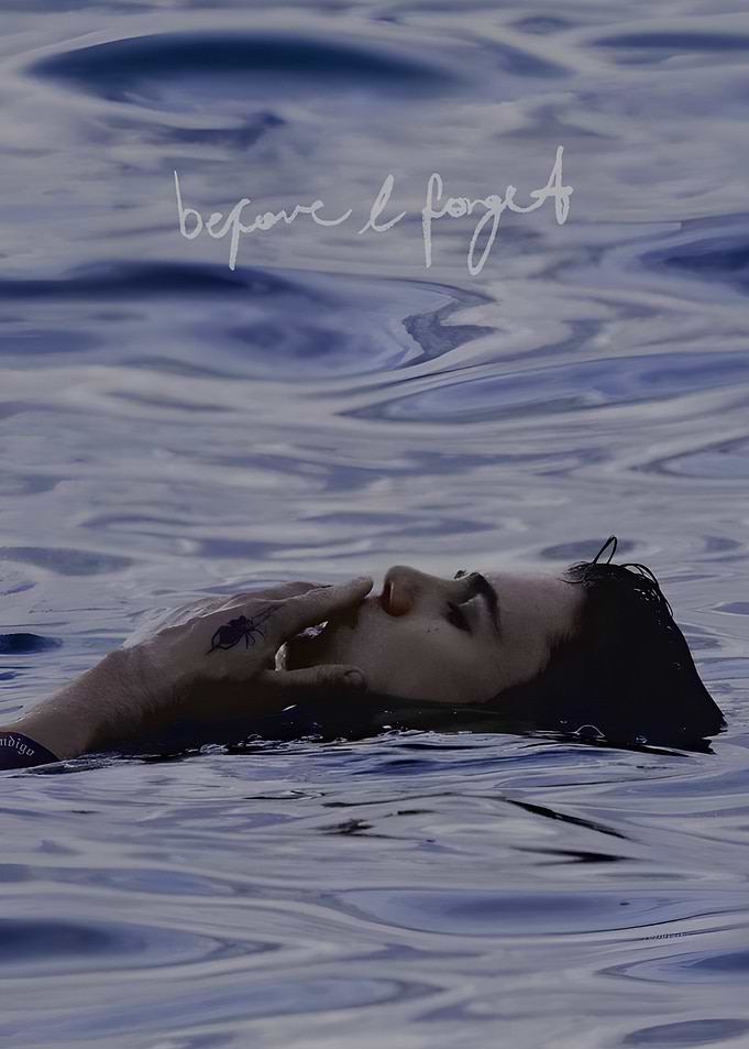 Person floating in water with text
