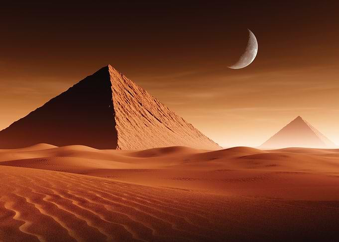 Desert Pyramids Under a Crescent Moon