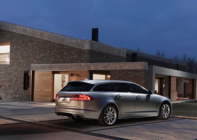 Jaguar Estate Car in Modern Driveway