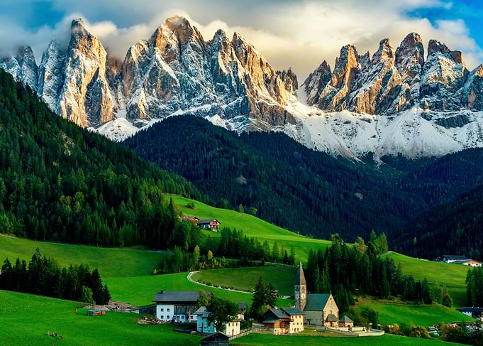Alpine Village with Snow-Capped Mountains