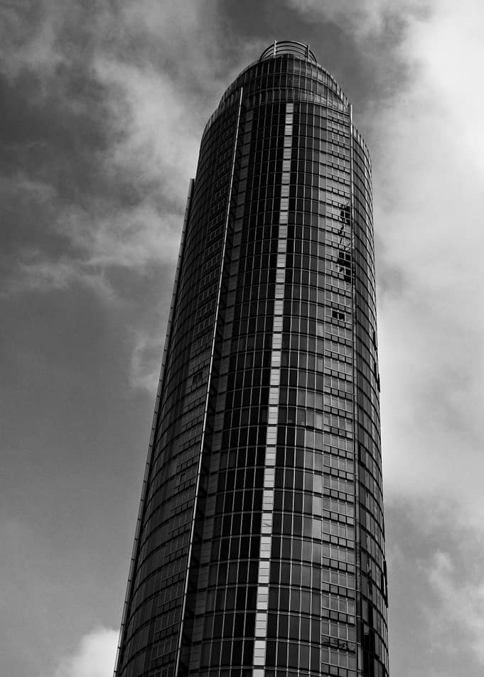 Modern Skyscraper Against Cloudy Sky