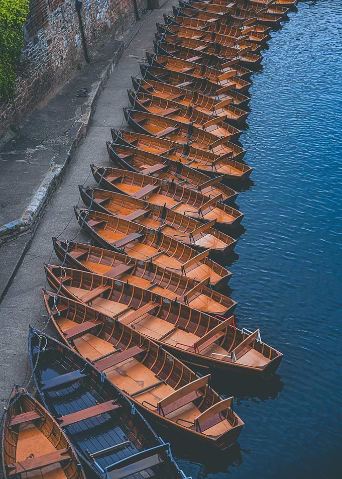 Rowboats docked on a canal