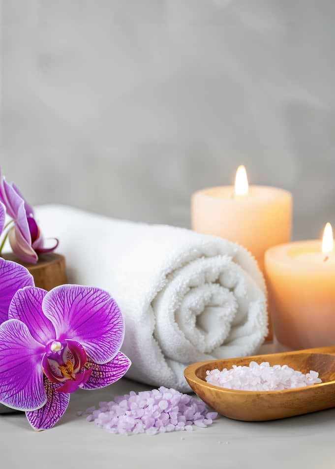 Spa scene with orchids and candles