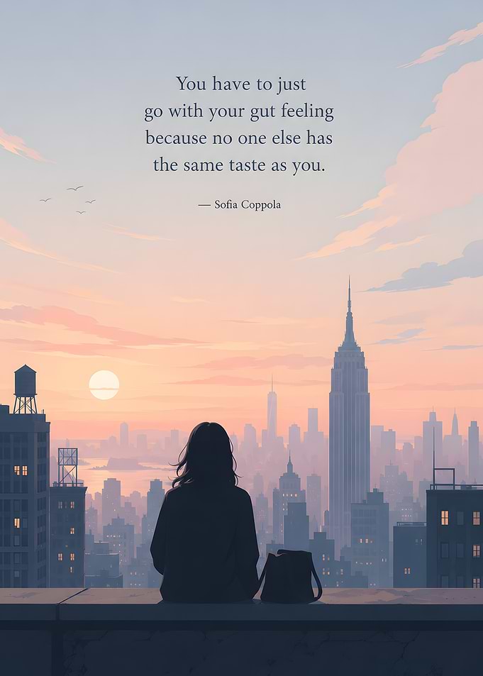 Woman overlooking New York City at sunset