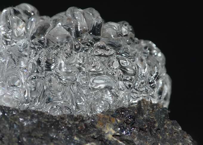 Hyalite — Liquid Glass Frozen in Stone