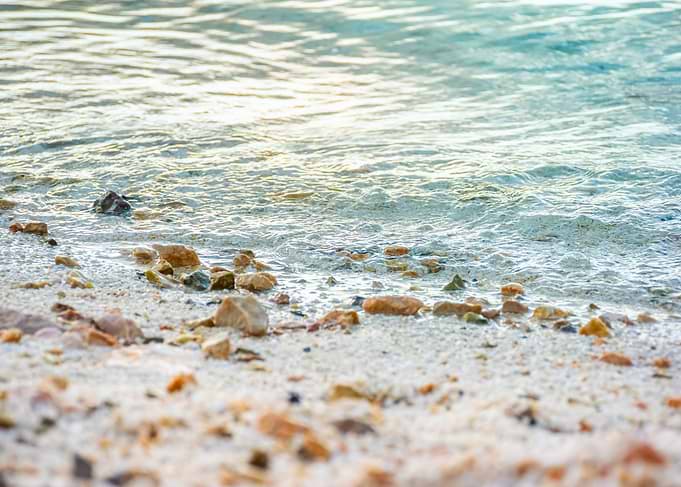 Gentle Waves on a Pebble Beach