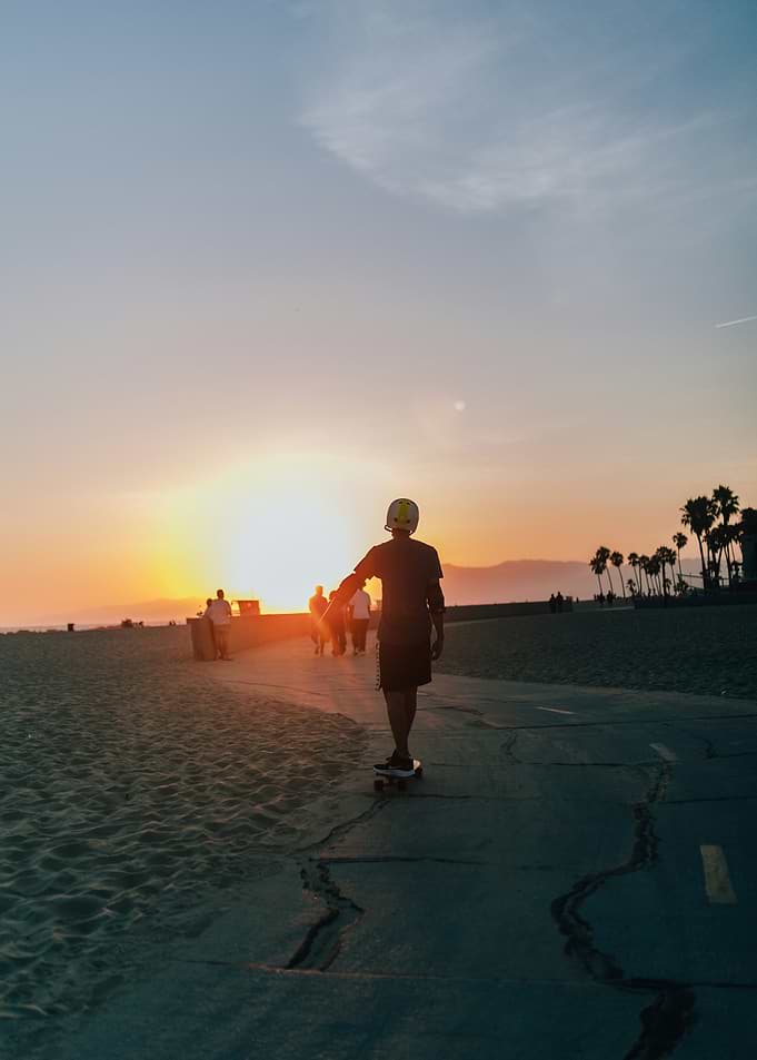 Skateboarding at Sunset on the Beach