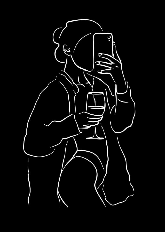 Woman taking a selfie with wine