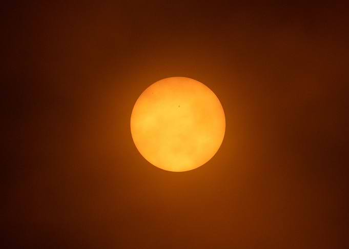 Sun with a small dark spot