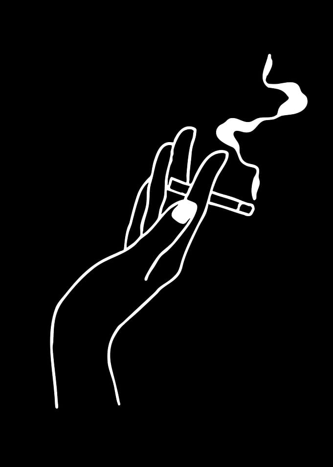 Hand holding a cigarette with smoke