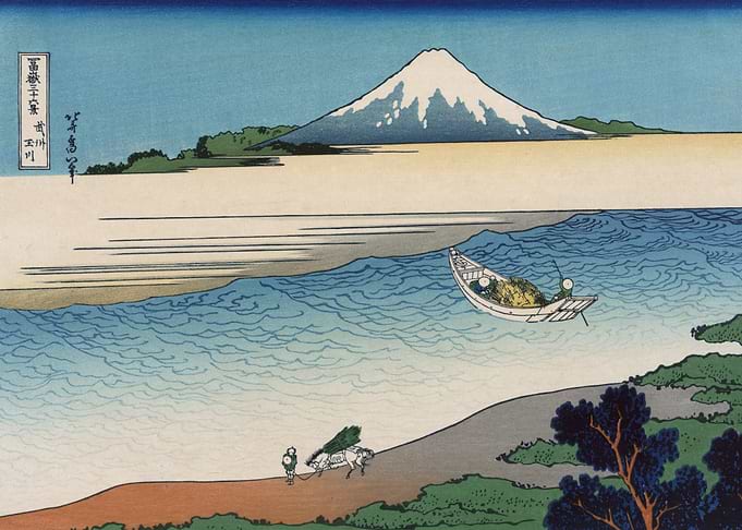 Mount Fuji and a boat on the water