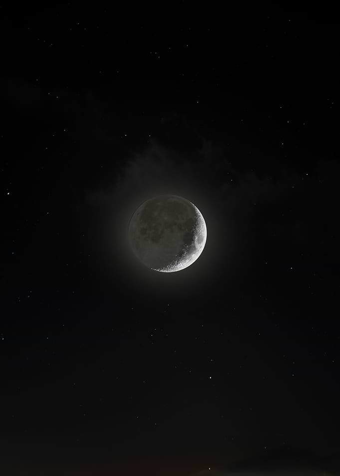 Crescent Moon in Starry Night Sky