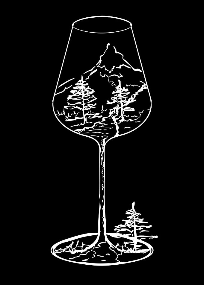 Wine glass with mountain landscape