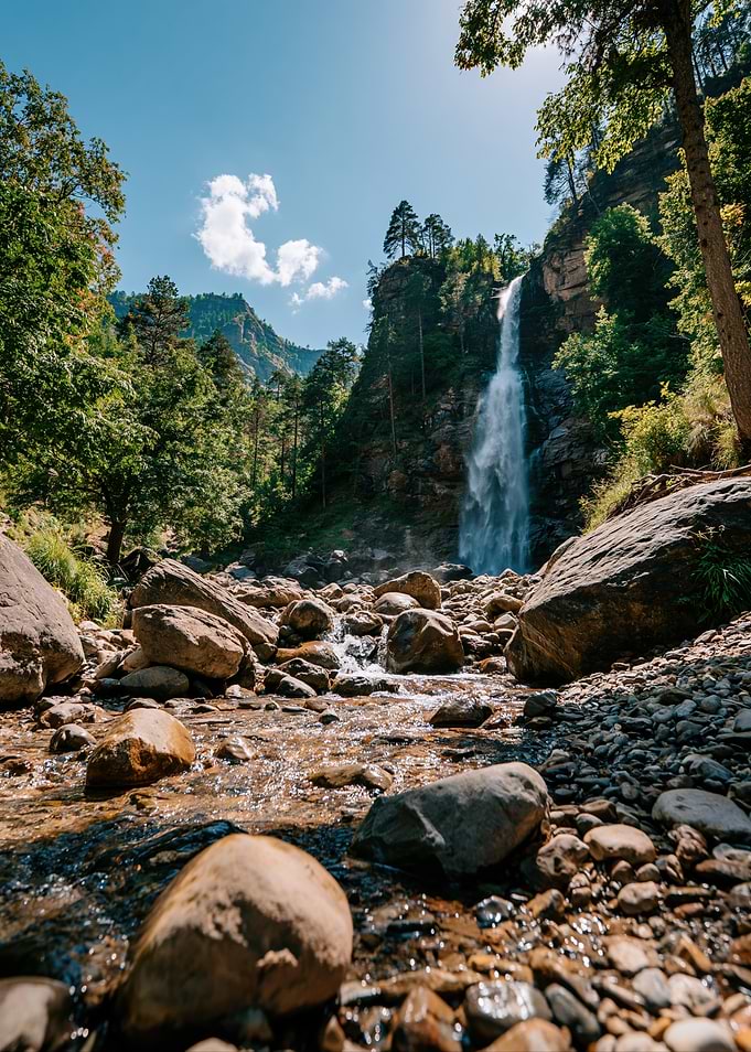 Majestic Waterfall in a Rocky Mountain Forest