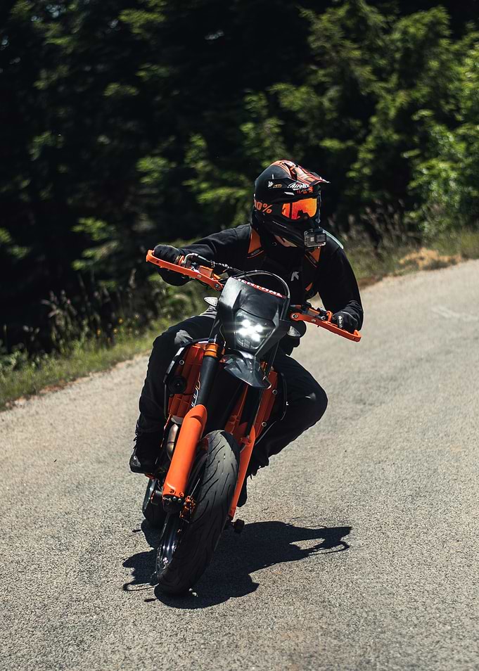Motorcyclist on a winding road